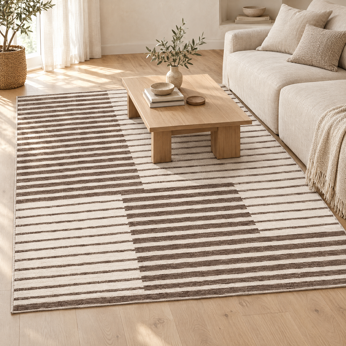 Mocha brown striped short pile rug under a linen sofa