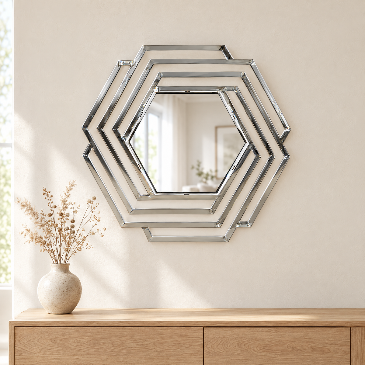 Layered hexagonal steel mirror above an oak sideboard
